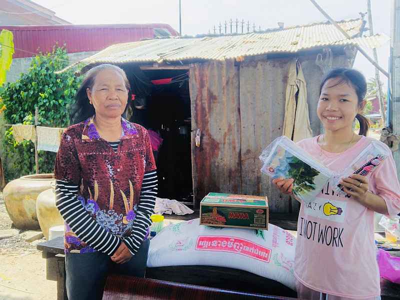 Sopheak and her mom received our donation at Sa Ang District